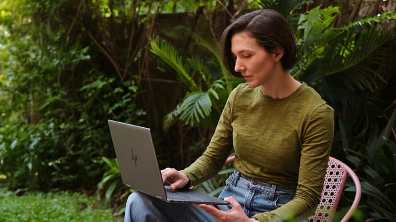 Woman reading on laptop